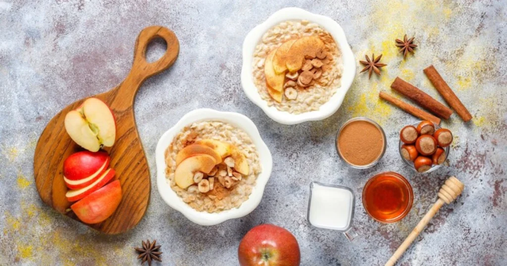 Close-up of creamy Apple Cinnamon Oatmeal with diced apples and cinnamon sprinkled on top