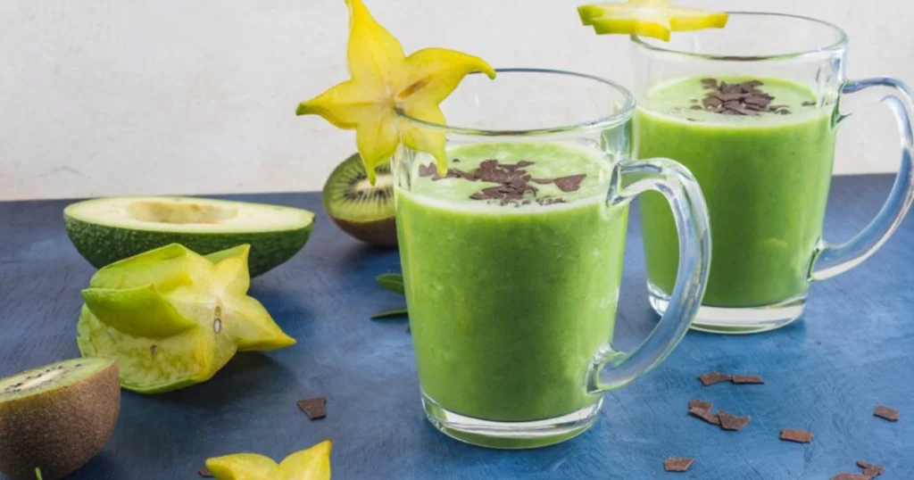 Green smoothie with avocado and kiwi, a healthy and refreshing drink.